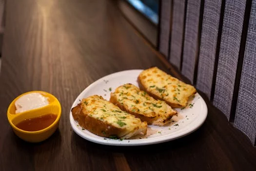 cheesy garlic bread melted butter herbs