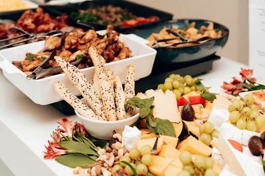 catering appetizers platter with wings and breadsticks